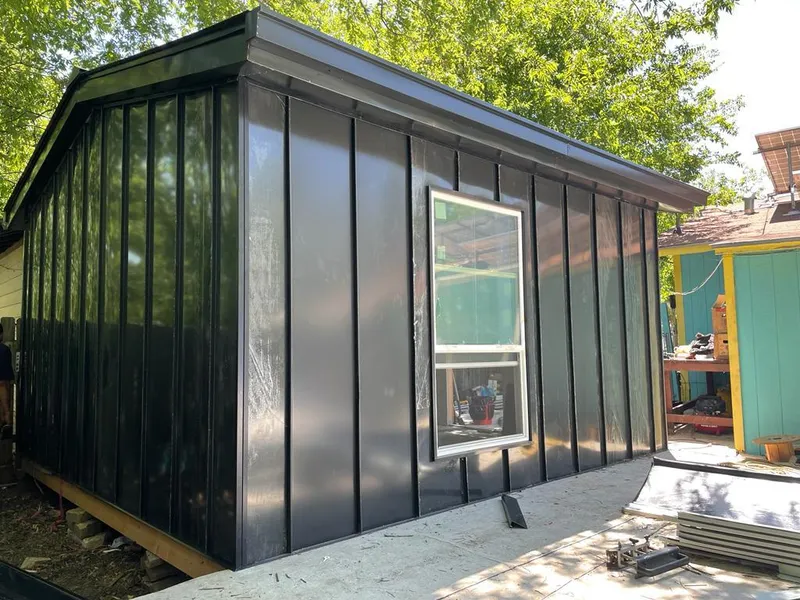 Black standing seam metal wall panels for Metal Roof Installation in Livingston